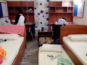 The hostel room.